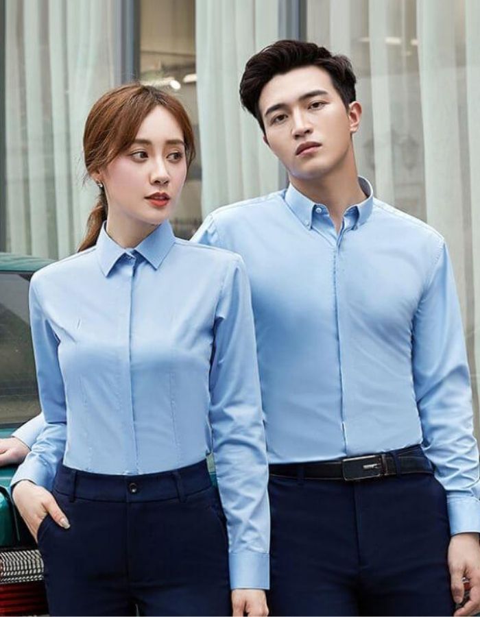 Mẫu đồng phục công ty áo sơ mi xanh nhạt cho cả nam và nữ